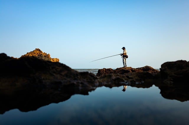 Omani coast drifts in Muscat for sea breeze and mountain curves